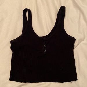 Black ribbed crop top with buttons on the front by Bershka. Size: S.